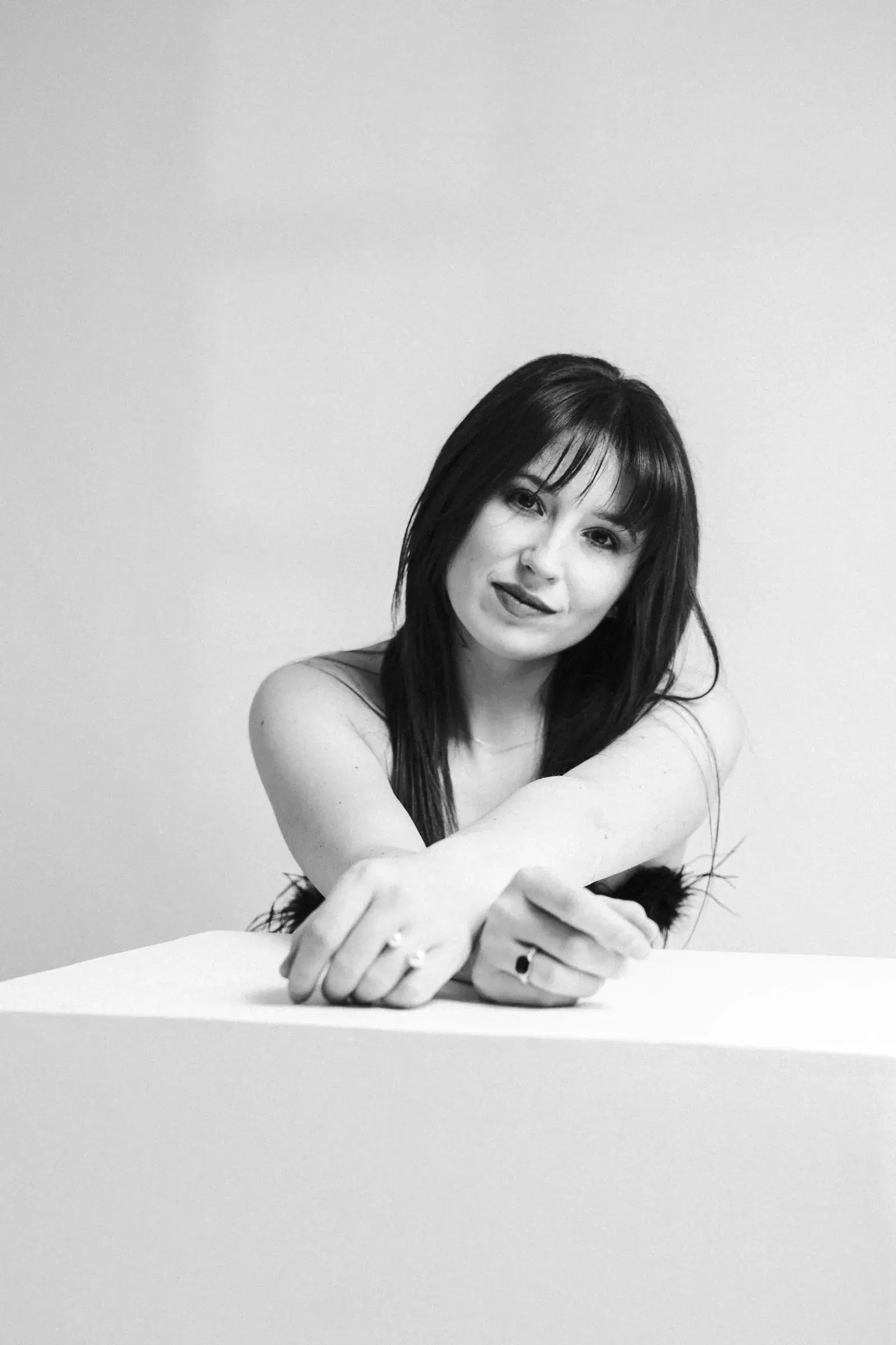 Black and white studio portrait of a woman